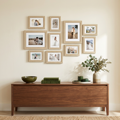 Ten-frame gallery styled above a walnut console