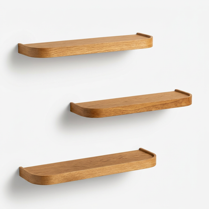 Set of three empty warm wood-look wall display ledges on white